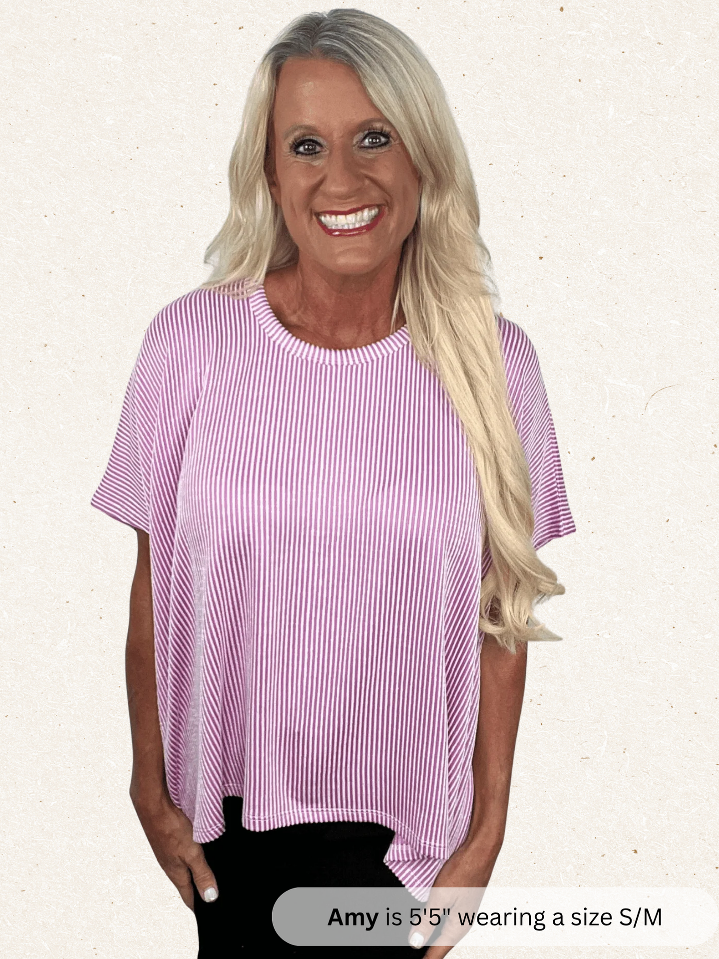 /Mauve/ Woman wearing a pink and white striped shirt on a plain background