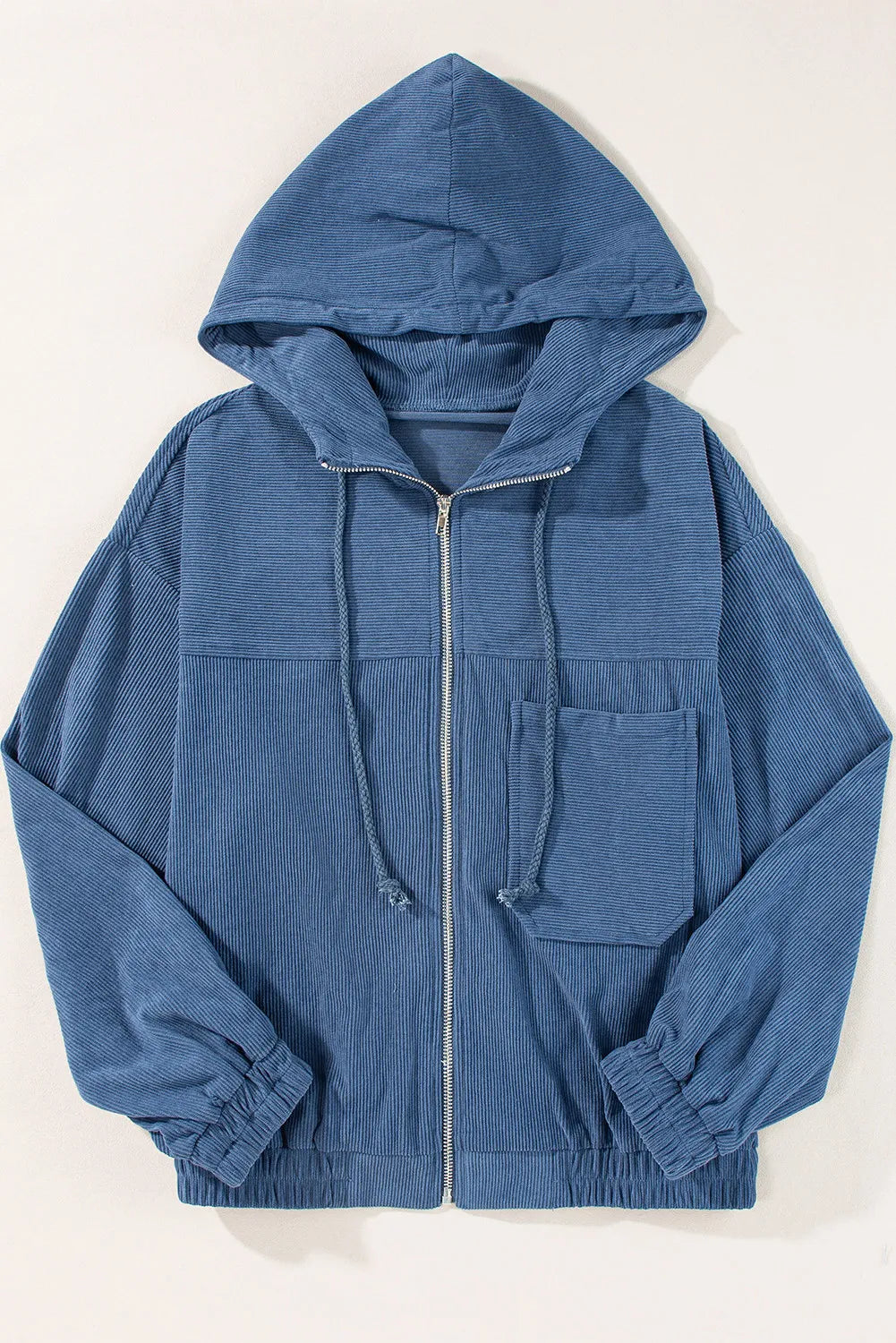 Blue hoodie with a zipper on a white background