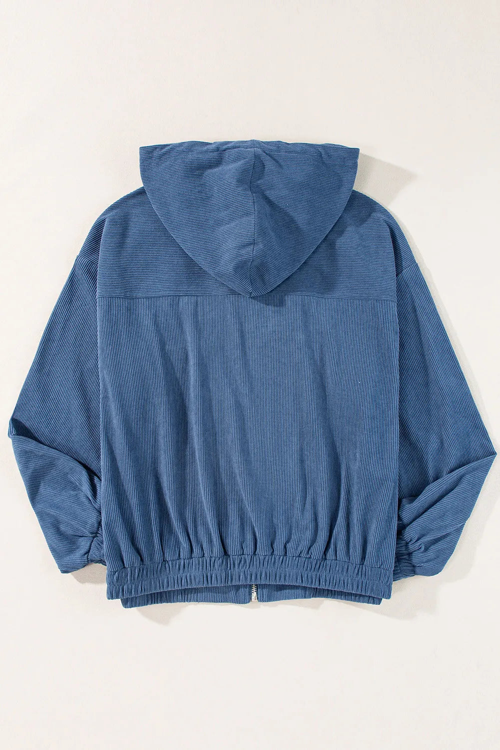 Blue hooded jacket on a white background