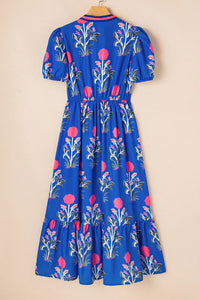 Blue dress with floral pattern on a beige background
