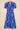 Blue floral dress on a beige background