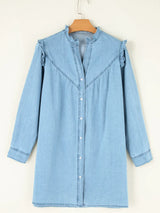 Light blue denim dress on a hanger against a white background